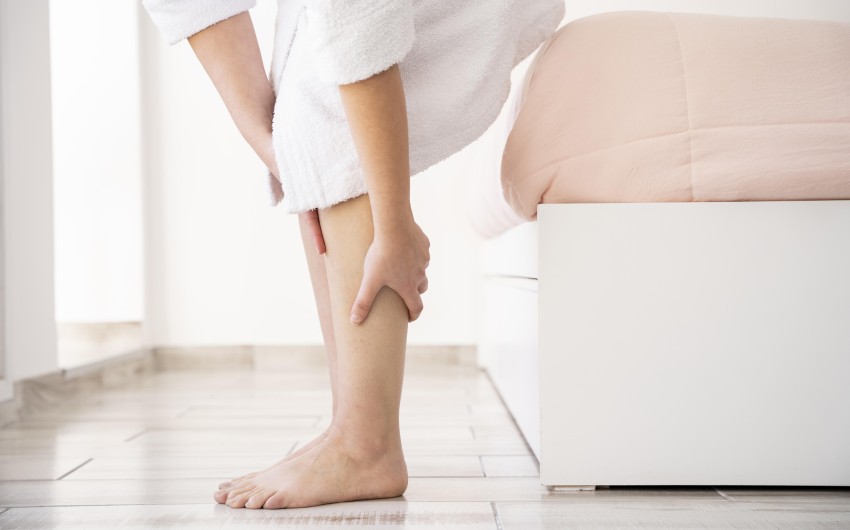 close-up-hands-massaging-legs.jpg